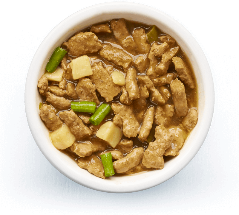 An image of Tails wet food. Country casserole with chicken, potato & green beans in tasty gravy.