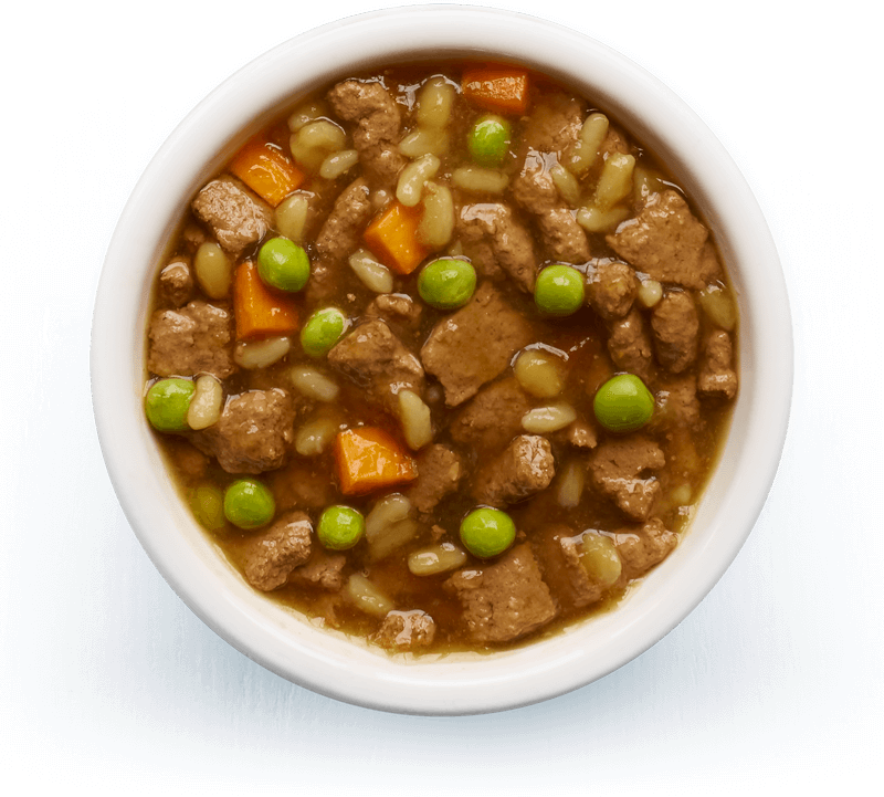 An image of Tails wet food. Slow-cooked stew with beef, rice & vegetables in tasty gravy