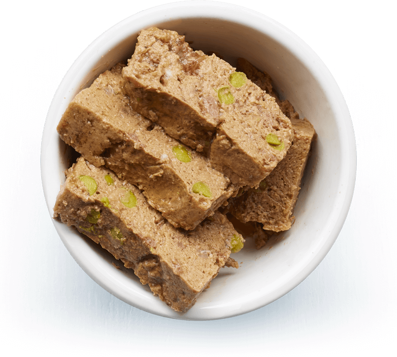 An image of Tails wet food. Tender terrine with chicken, turkey & peas