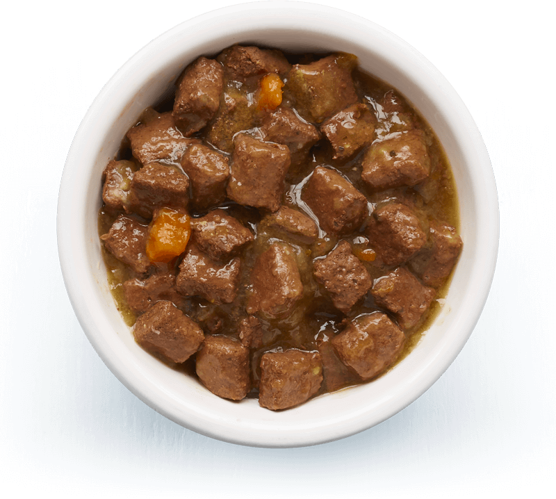 An image of Tails wet food. Shepherd's hotpot with lamb, vegetables & rosemary in tasty gravy.